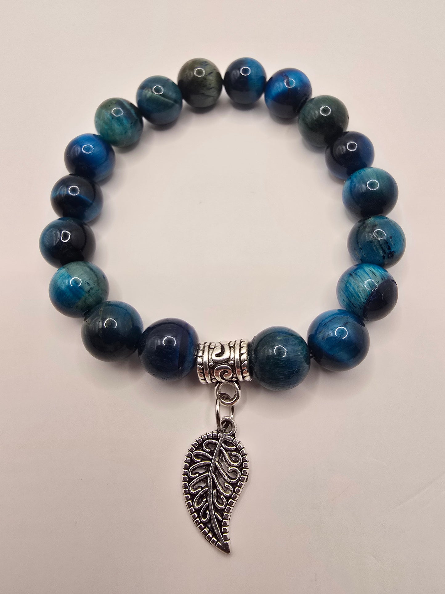 commercial shot of the blue beaded elasticated bracelet on a white background