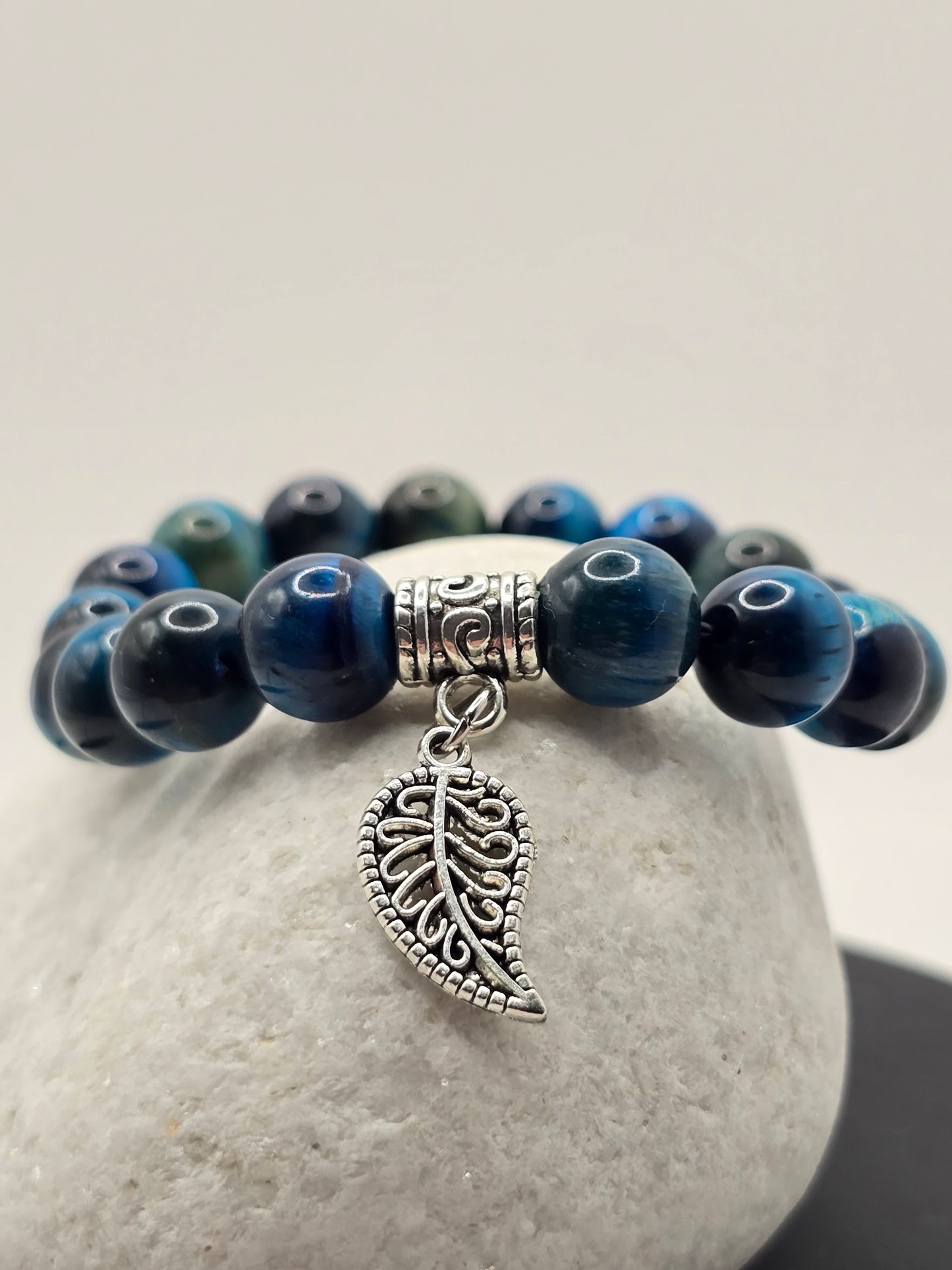 front view of a silver leaf dangle charm