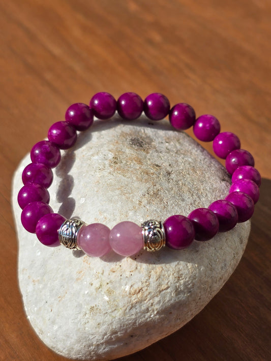 women's elasticated Beaded bracelet with striking pink beads on a white stone pebble