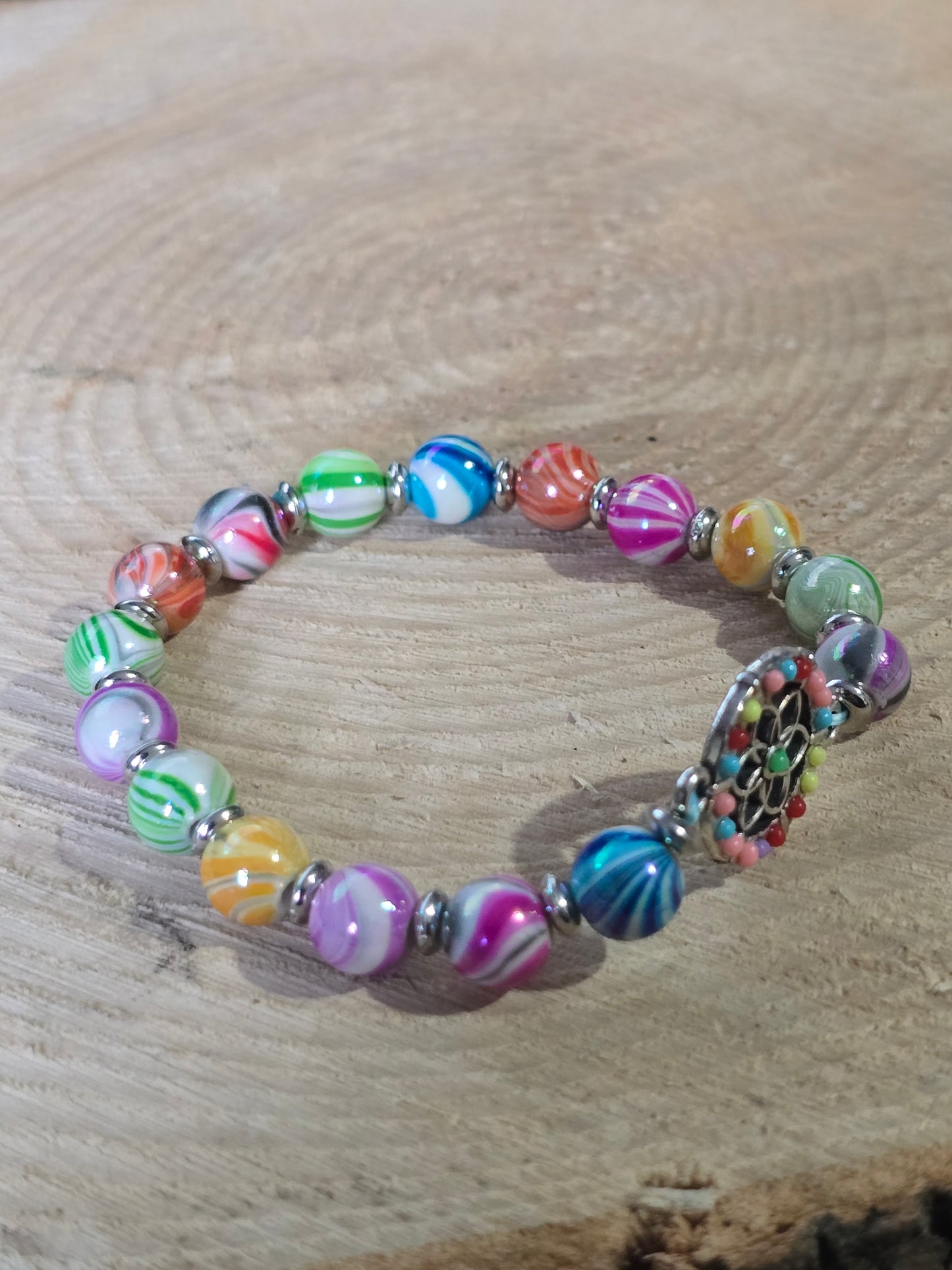 Kids beaded bracelet, multicoloured elastic bracelet with various colourful charms