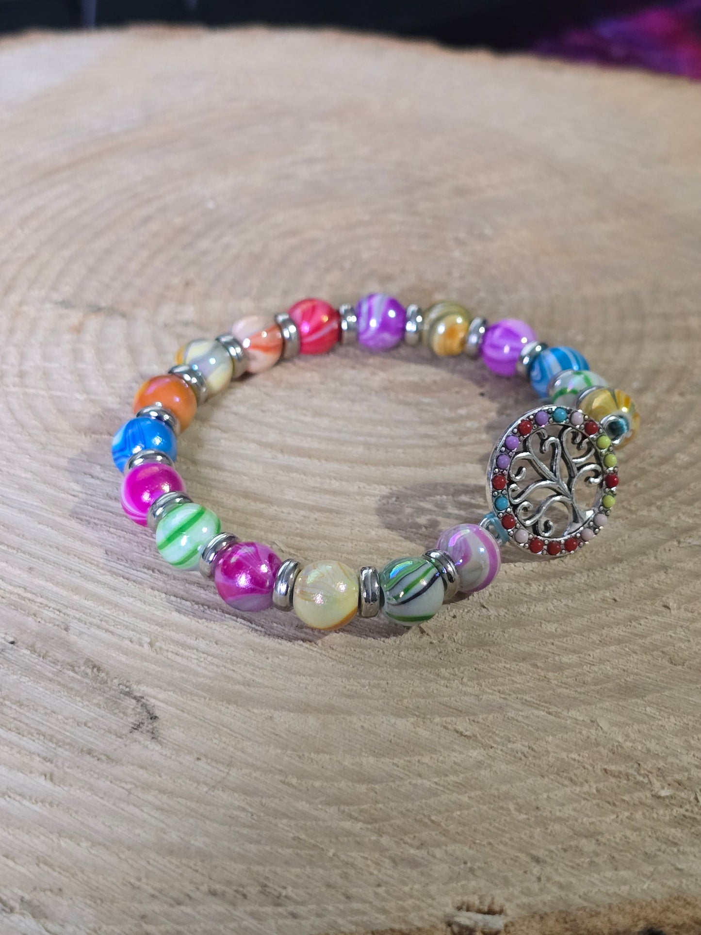 Kids beaded bracelet, multicoloured elastic bracelet with various colourful charms