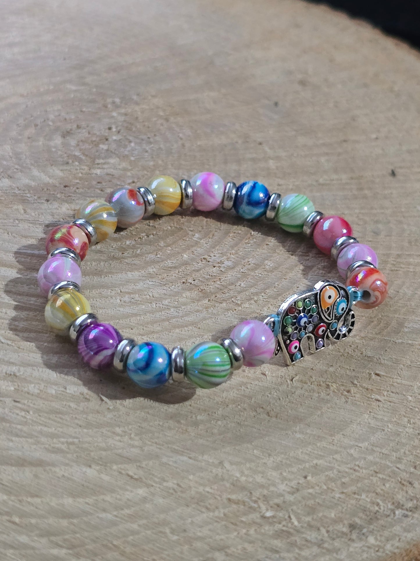 Kids beaded bracelet, multicoloured elastic bracelet with various colourful charms