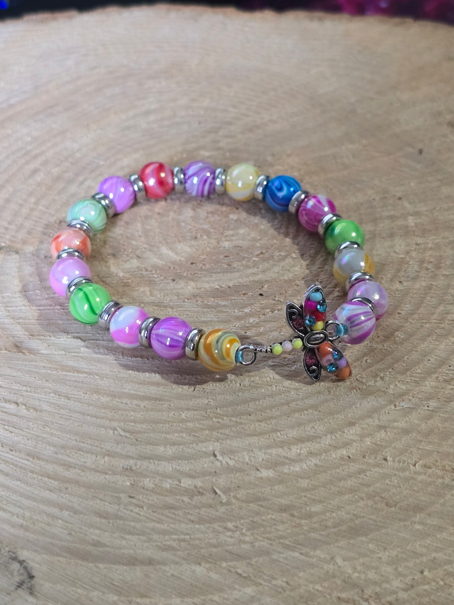 Kids beaded bracelet, multicoloured elastic bracelet with various colourful charms