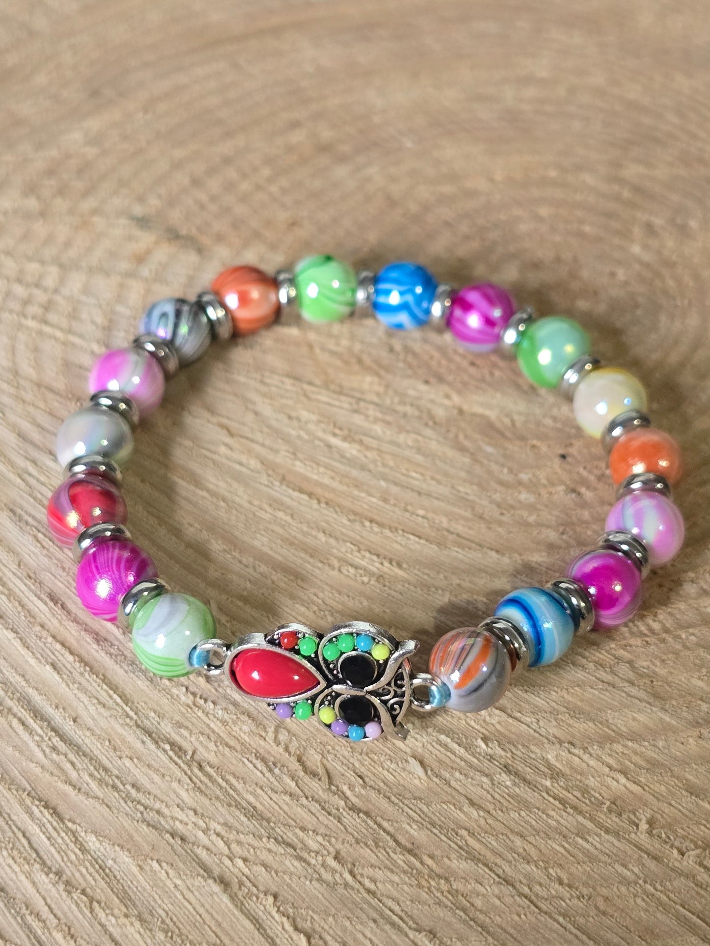 Kids beaded bracelet, multicoloured elastic bracelet with various colourful charms