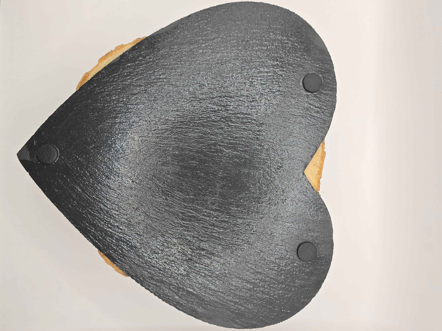 underside of heart shaped slate cheese board