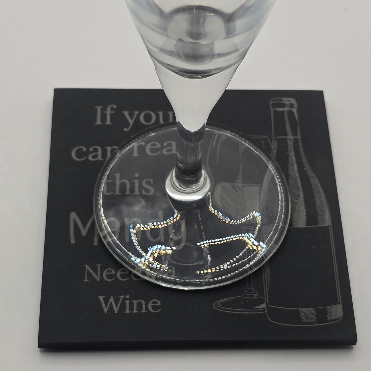 wine glass on a personalised slate drinks coaster and funny wine quote