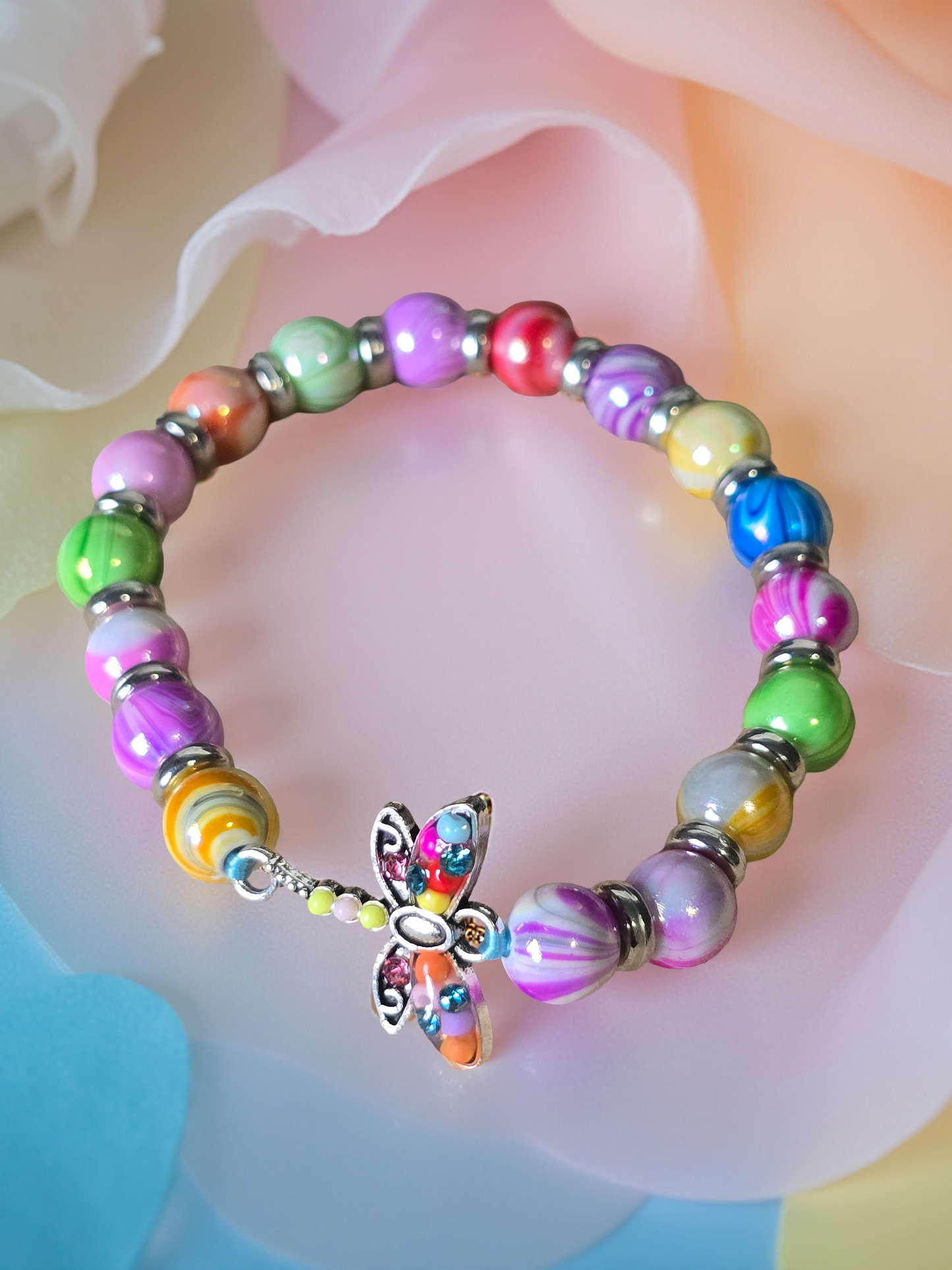 Kids beaded bracelet, multicoloured elastic bracelet with various colourful charms