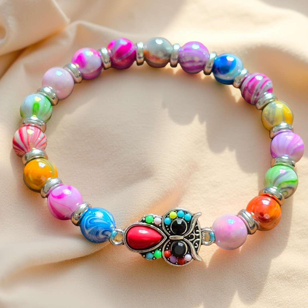 Kids beaded bracelet, multicoloured elastic bracelet with various colourful charms