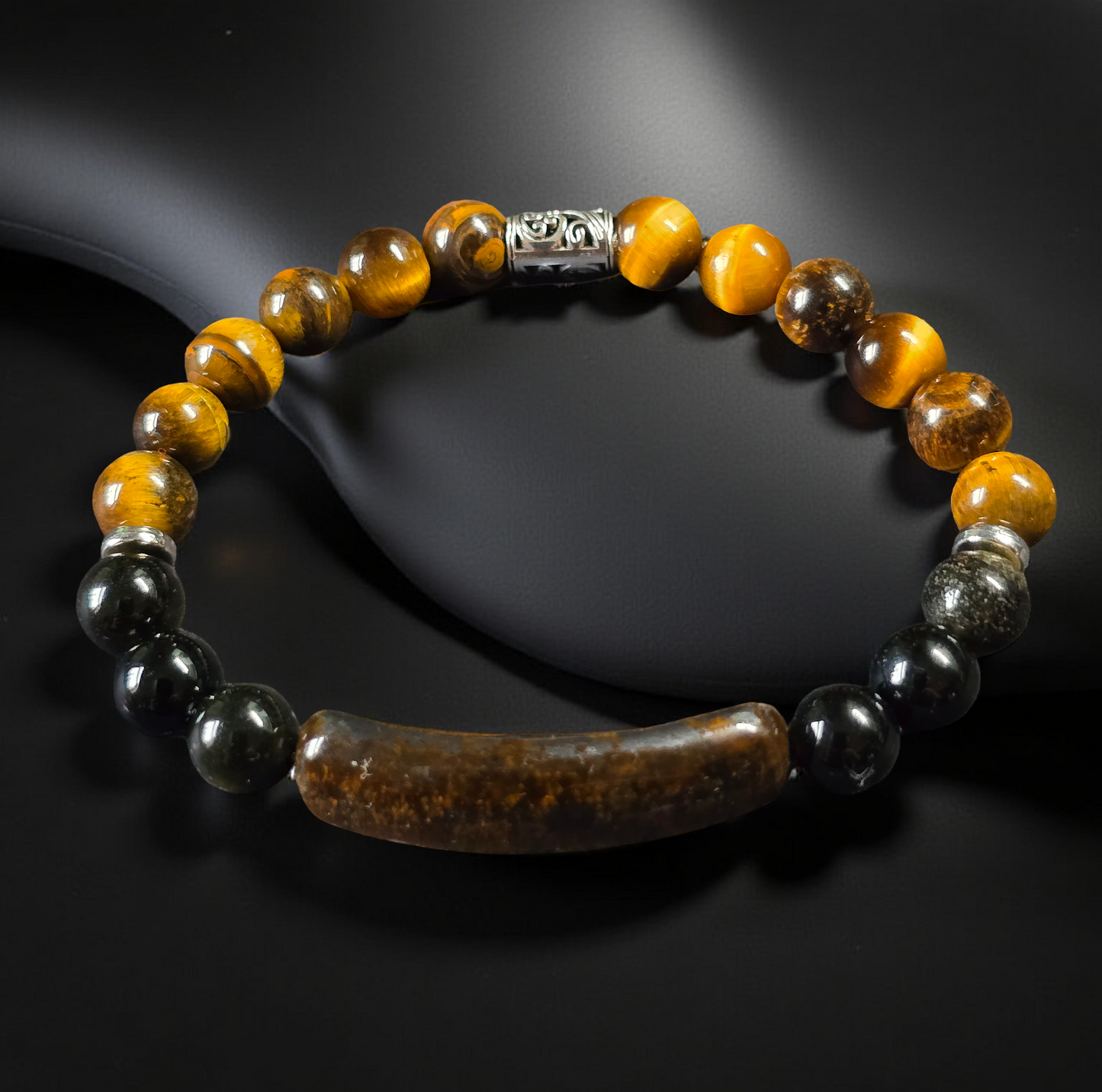Men's Tigers Eye Beaded bracelet with yellow, black, and brown beads on a dark background