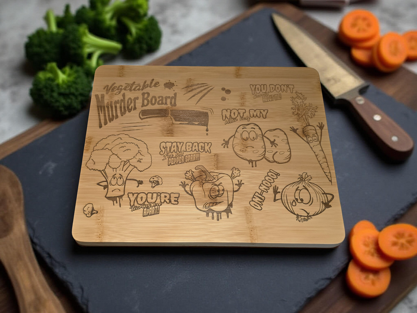 Wooden cutting board with vegetable-themed designs on a kitchen counter with vegetables and a knife.
