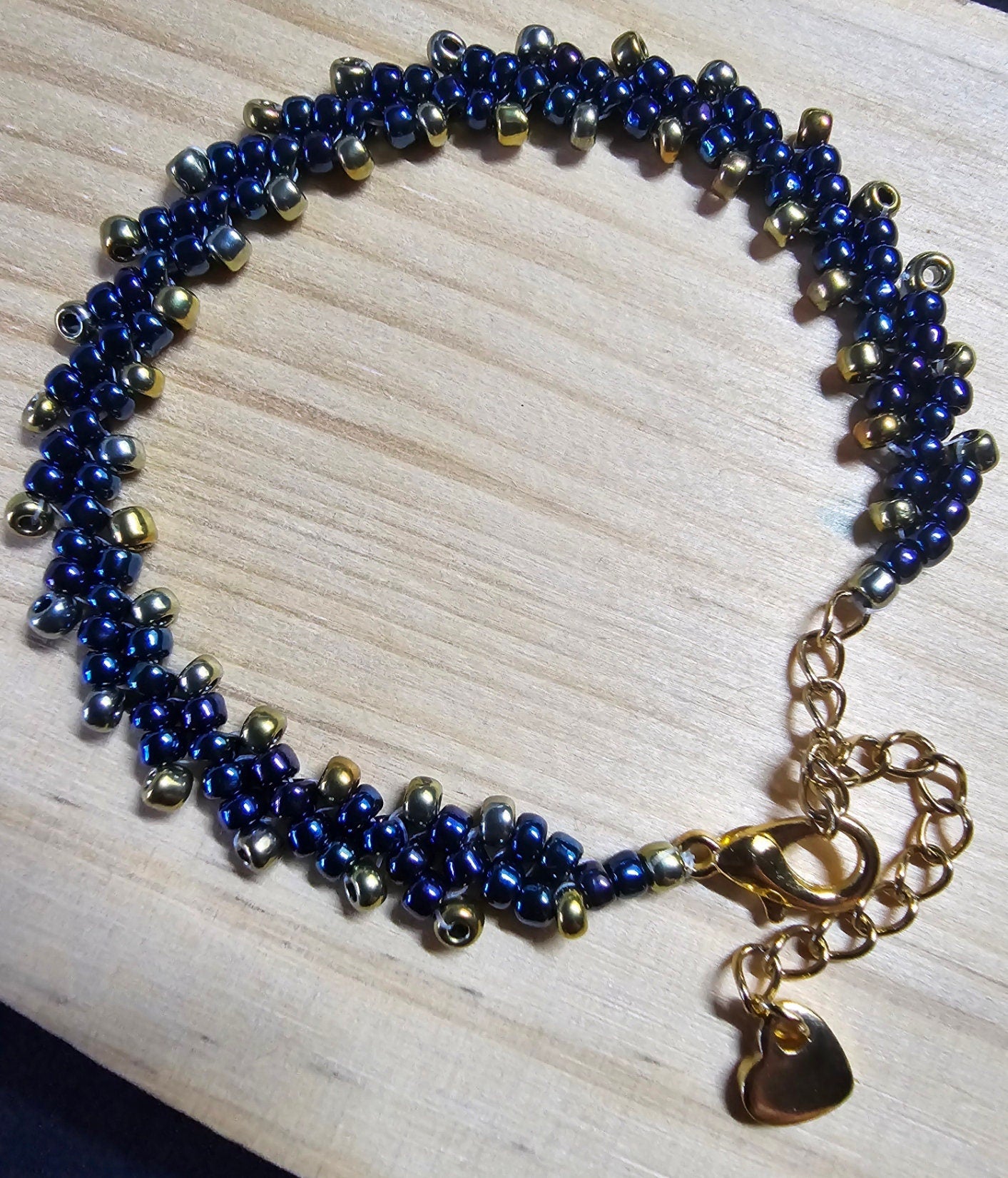 Blue and Gold Toho Seed Beaded Bracelet with gold heart extension chain