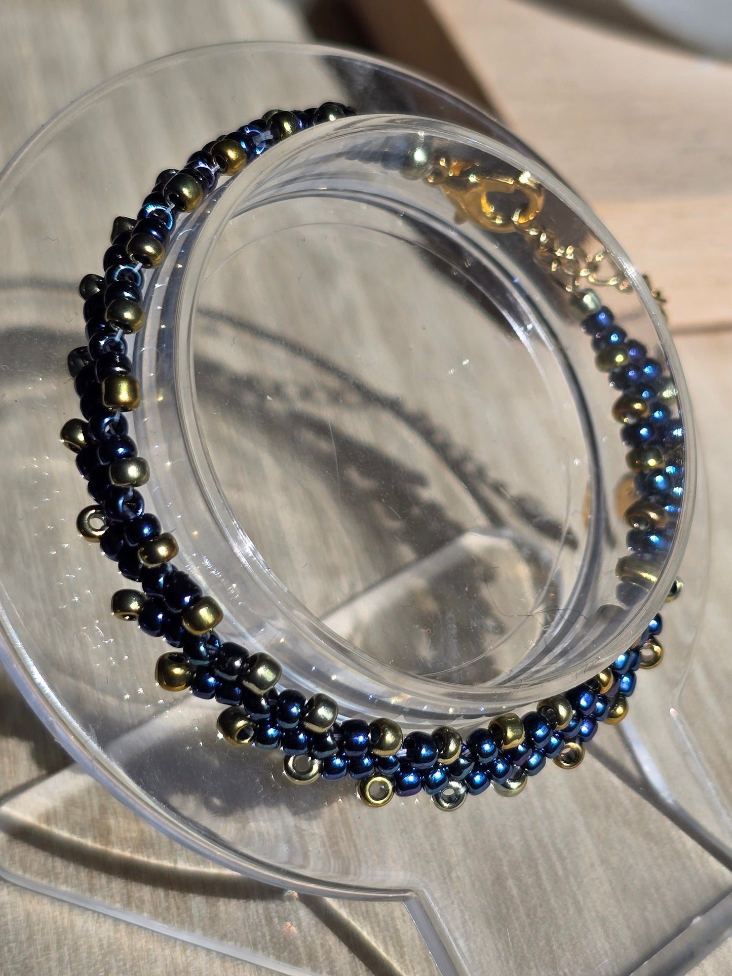 Blue and Gold Toho Seed Beaded Bracelet with gold heart extension chain