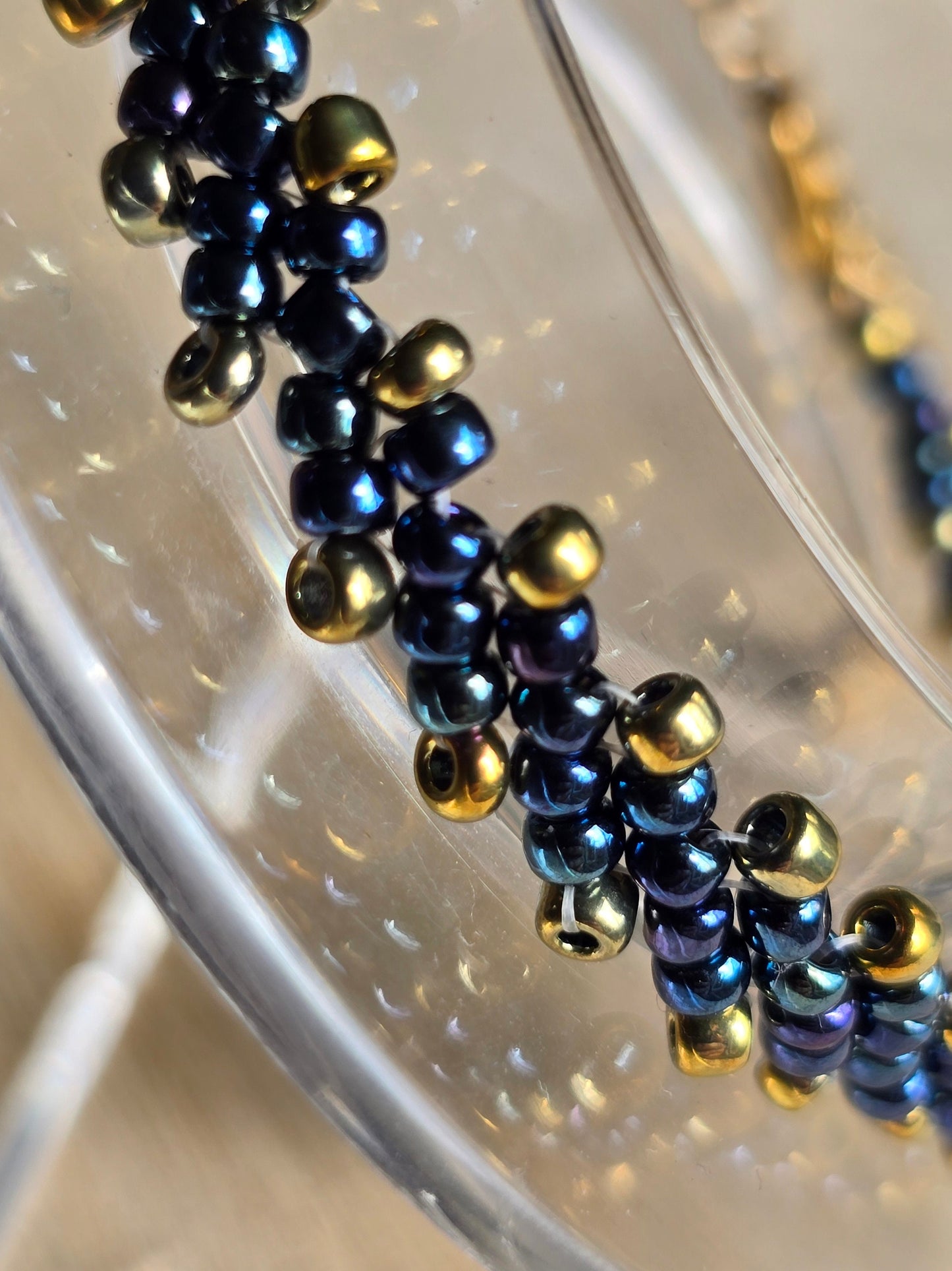 Blue and Gold Toho Seed Beaded Bracelet with gold heart extension chain