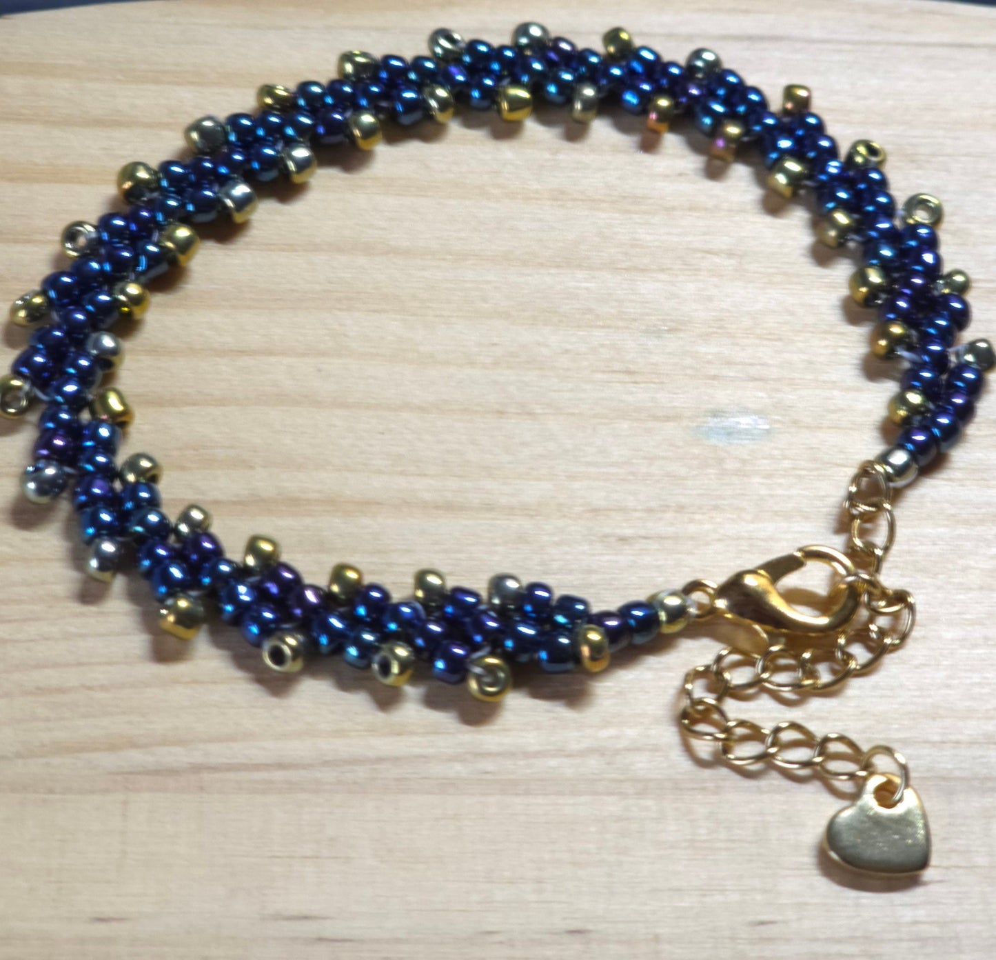 Blue and Gold Toho Seed Beaded Bracelet with gold heart extension chain