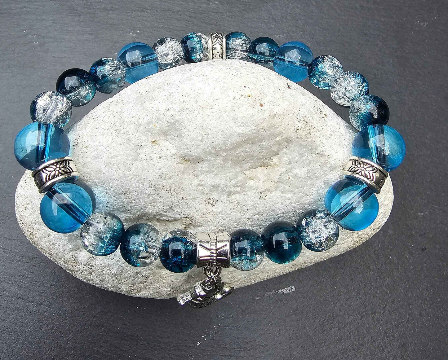 Seahorse charm beaded bracelet - Blue and clear glass beads and elasticated band to fit most wrist sizes