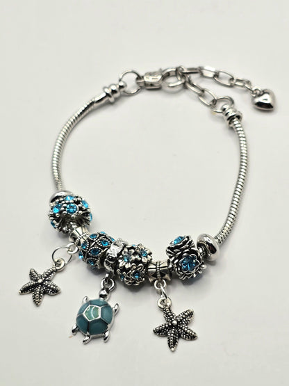 Ocean Themed Charm Bracelet - Sea Turtle and Starfish charms