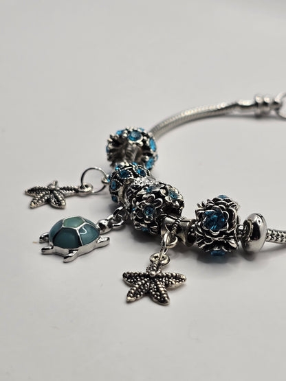 Ocean Themed Charm Bracelet - Sea Turtle and Starfish charms
