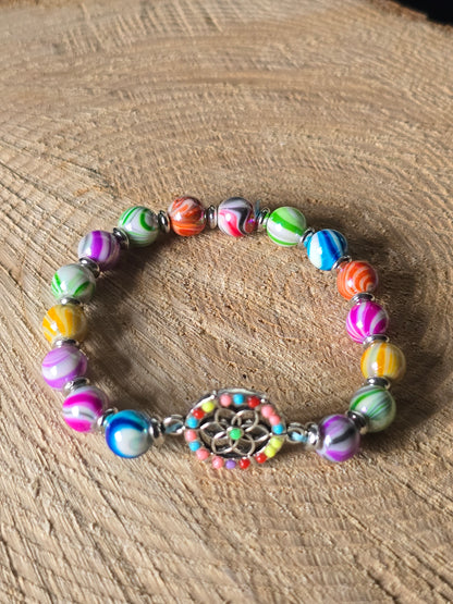 Kids beaded bracelet, multicoloured elastic bracelet with various colourful charms