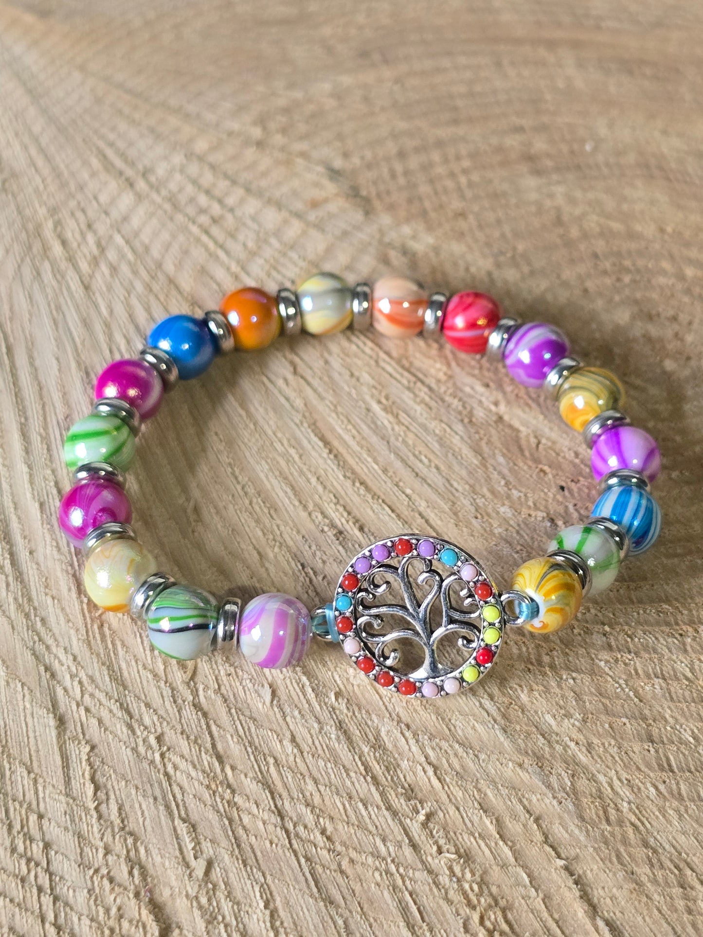 Kids beaded bracelet, multicoloured elastic bracelet with various colourful charms