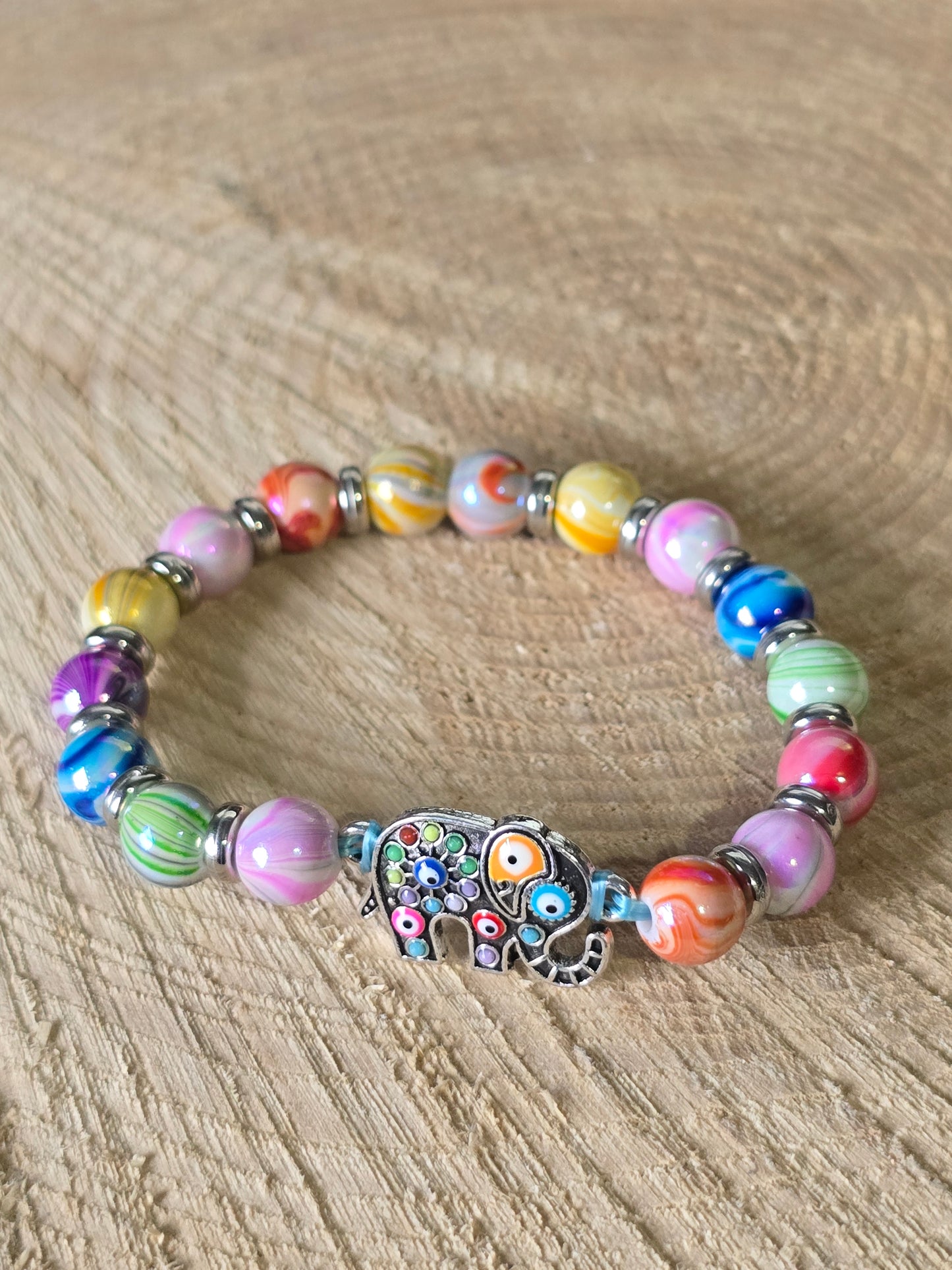 Kids beaded bracelet, multicoloured elastic bracelet with various colourful charms