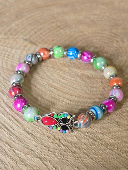 Kids beaded bracelet, multicoloured elastic bracelet with various colourful charms