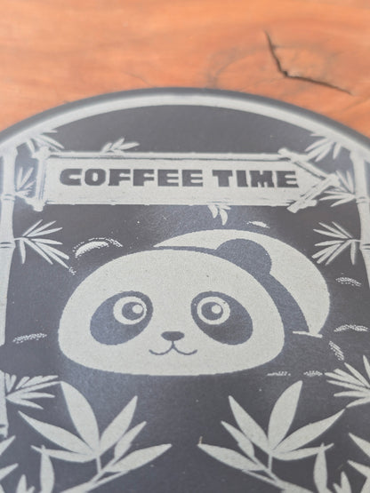 Stylized panda design with 'Coffee Time' text on a wooden background