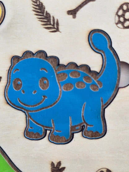 Blue wooden dinosaur puzzle piece, part of a kids dinosaur wooden puzzle game