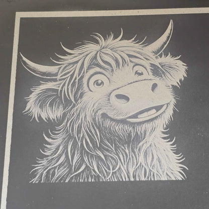 Illustration of a cute highland cow on a dark slate