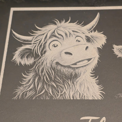 Illustration of a cute highland cow on a slate