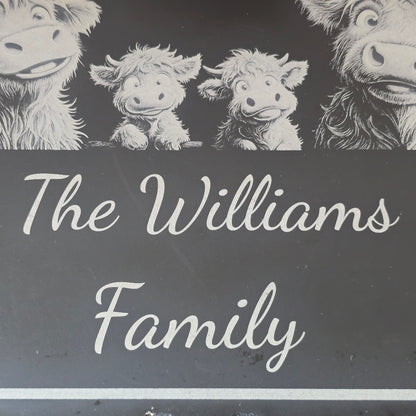 Engravings of highland cows with 'The Williams Family' text on a dark slate background