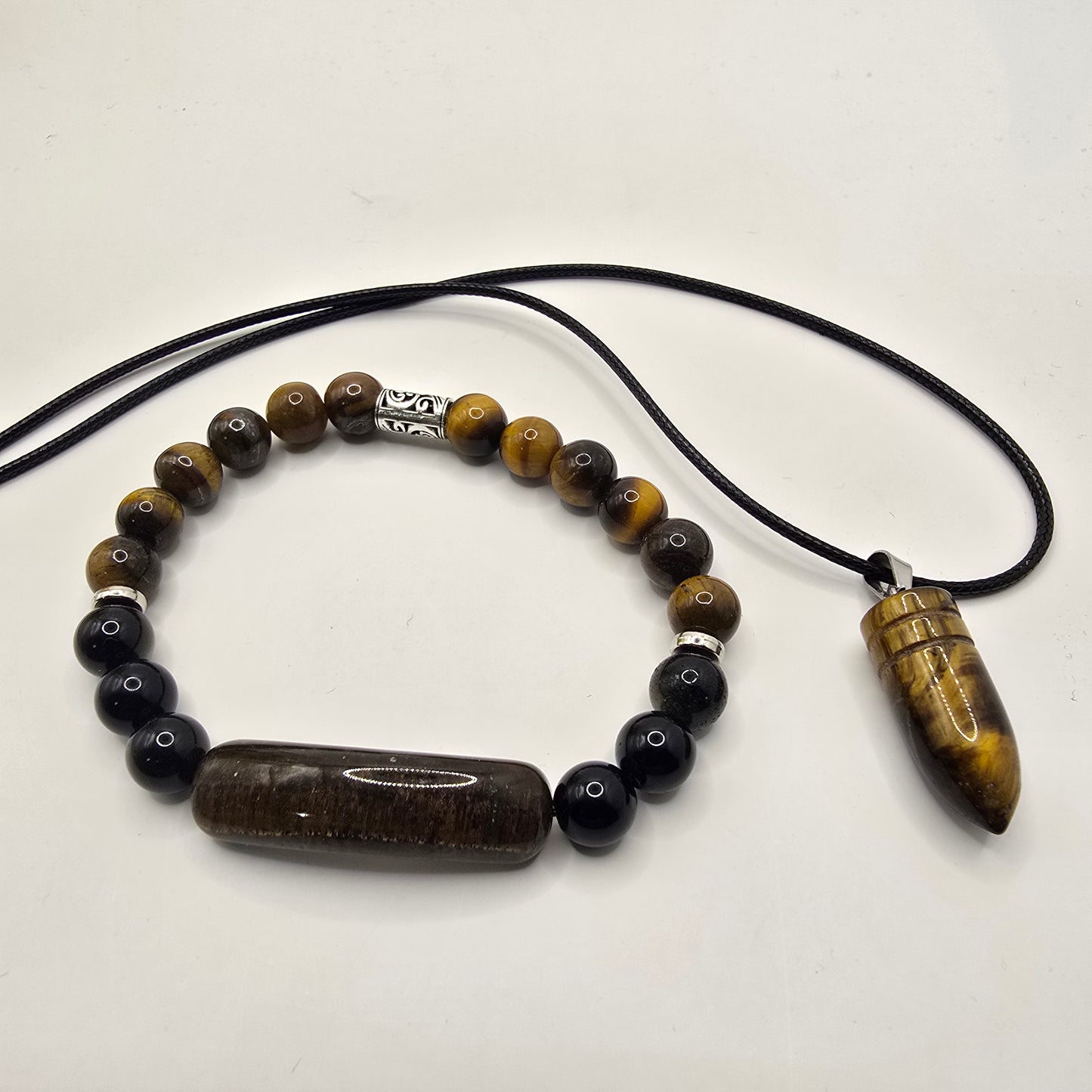 Tigers Eye beaded bracelet with black and brown stones with a tigers eye necklace for men on a white background
