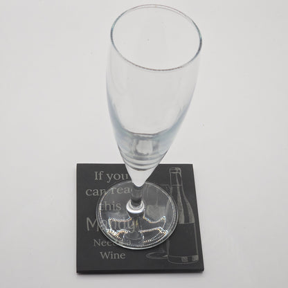 champaign flute resting on a custom coaster with the text "if you can read this Mandy needs a wine"