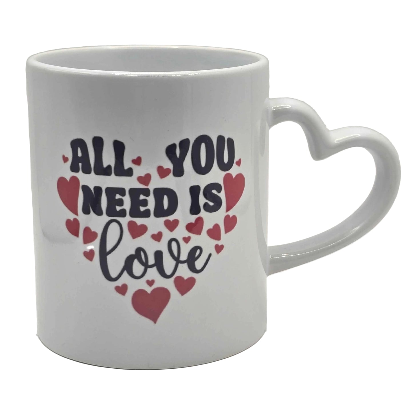 White mug with 'All You Need Is Love' text and heart designs. with a heart shaped handle