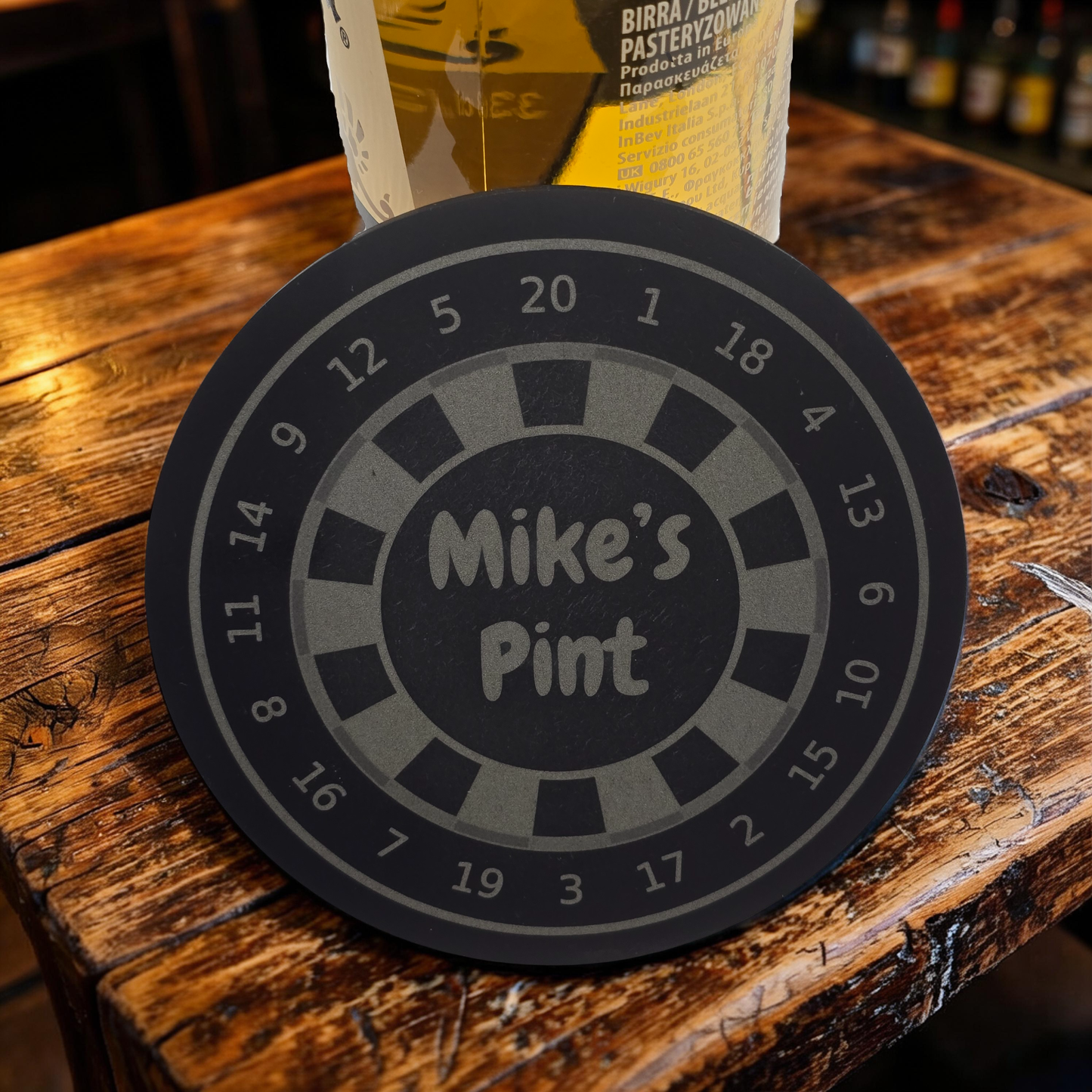 customised beer mat with mikes pint text engraved in the centre of a dartboard
