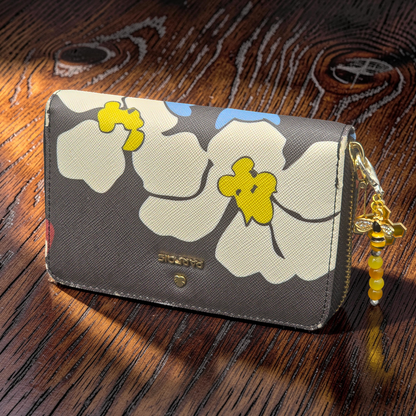 Floral-patterned wallet with a Bee themed handmade zip charm attatched