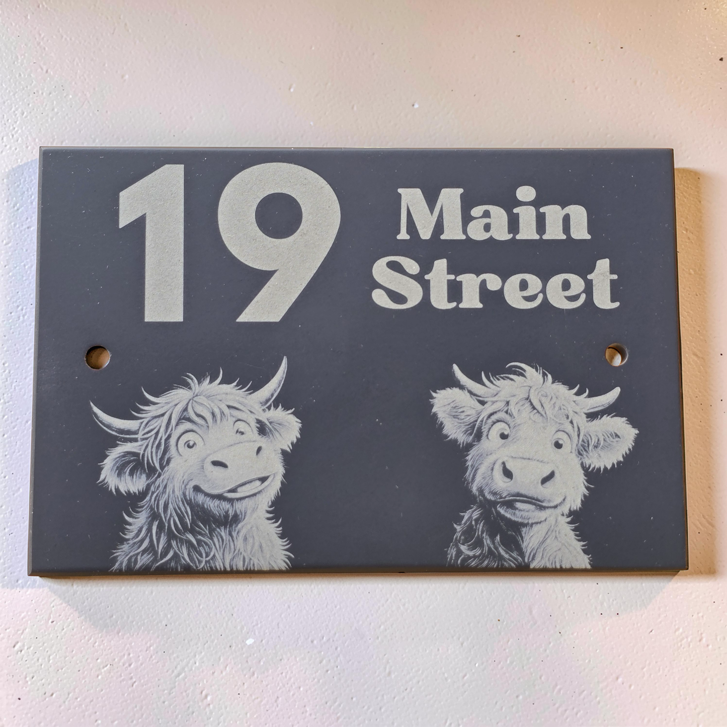 15cm x 10cm House number sign with highland cows on a dark background