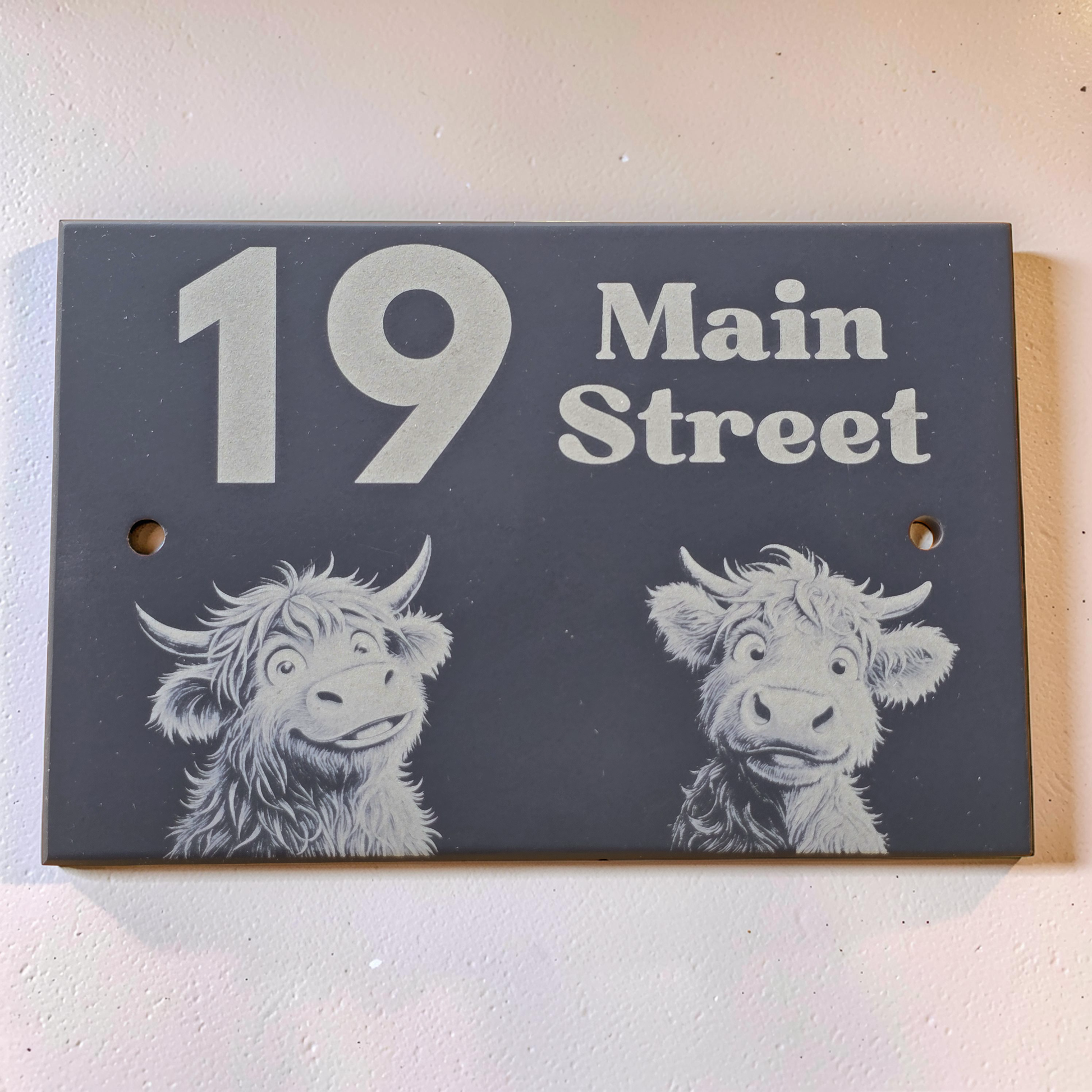 15cm x 10cm House number sign with highland cows on a dark background