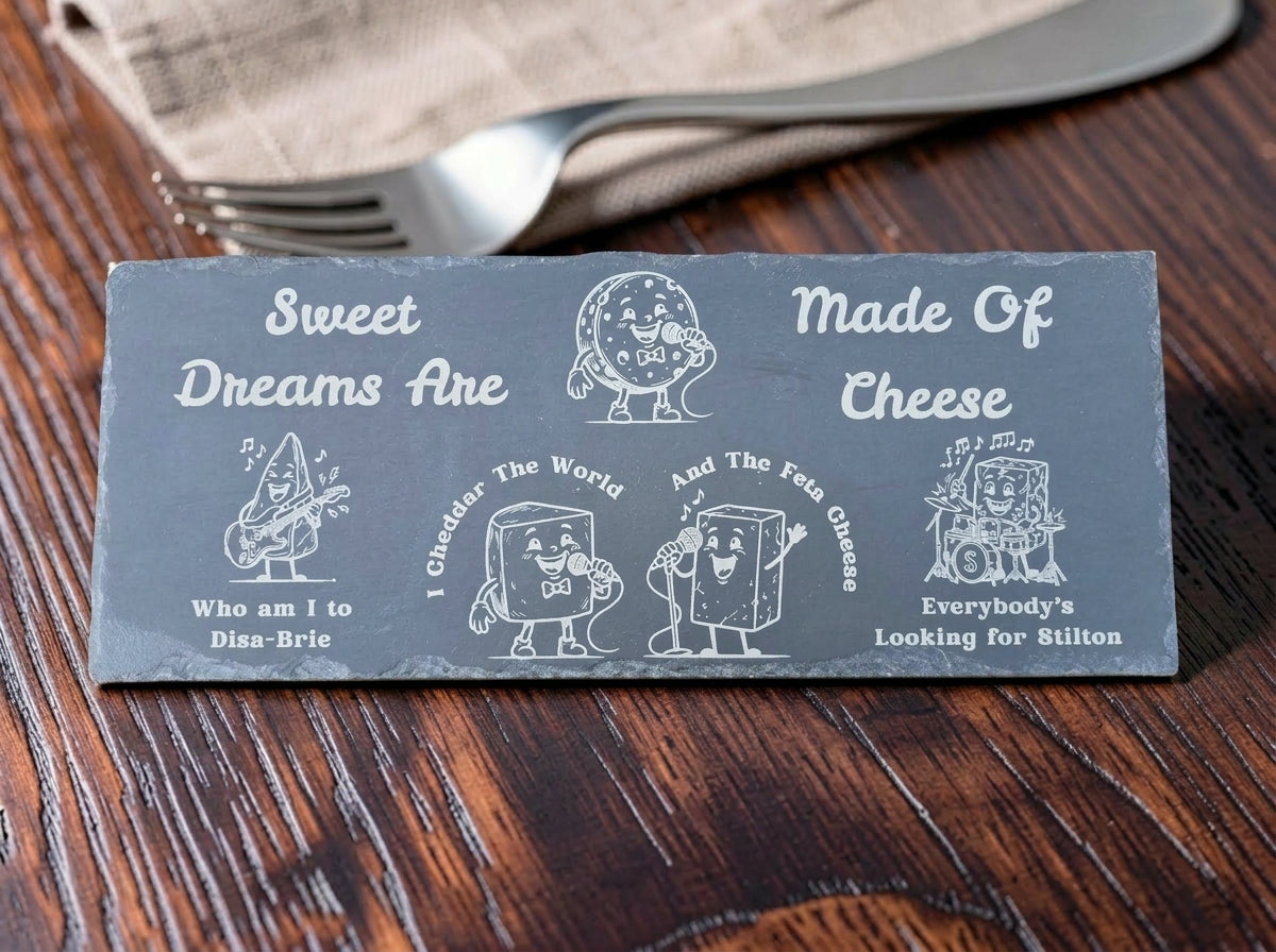 Slate board engraved with cartoon cheese musicians and Sweet Dreams Are Made of Cheese lyrics.