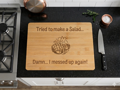 humorous bamboo chopping board with "tried to make a salad, damn I messed up again text