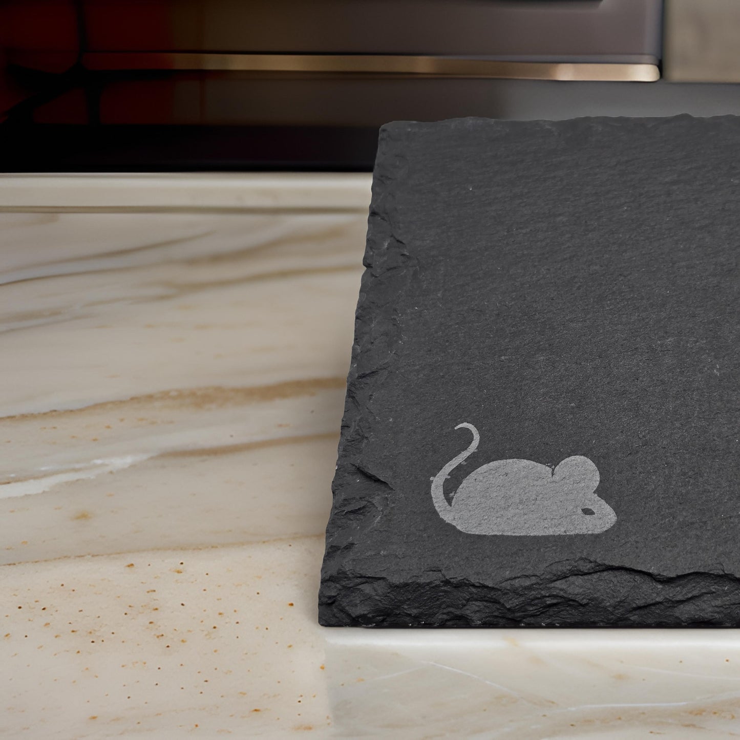 Slate cheese serving board with etched mouse and choose cheese graphic