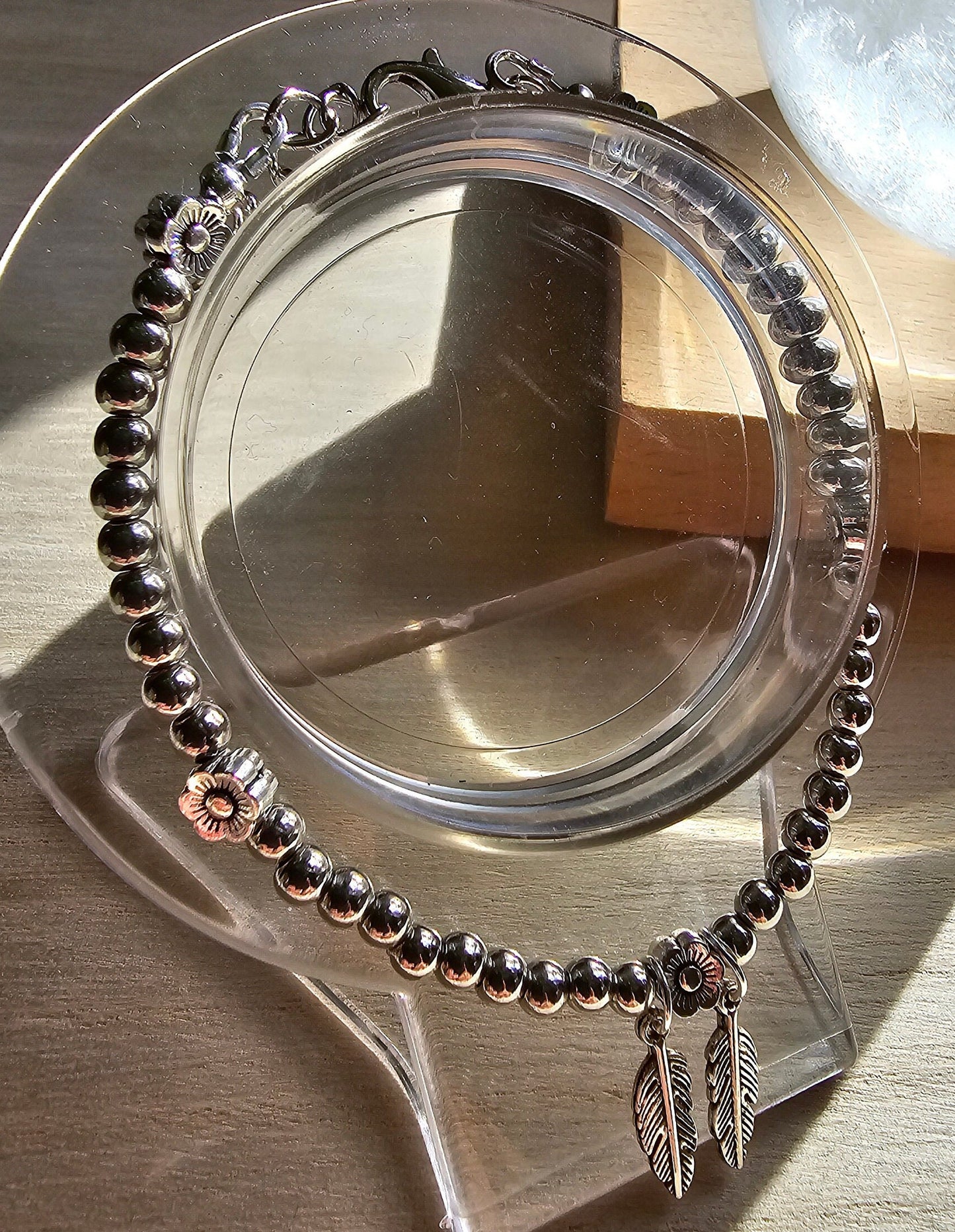 Feather and Flower Silver Beaded Bracelet - Silver beaded chain with daisy beads and leaf charms