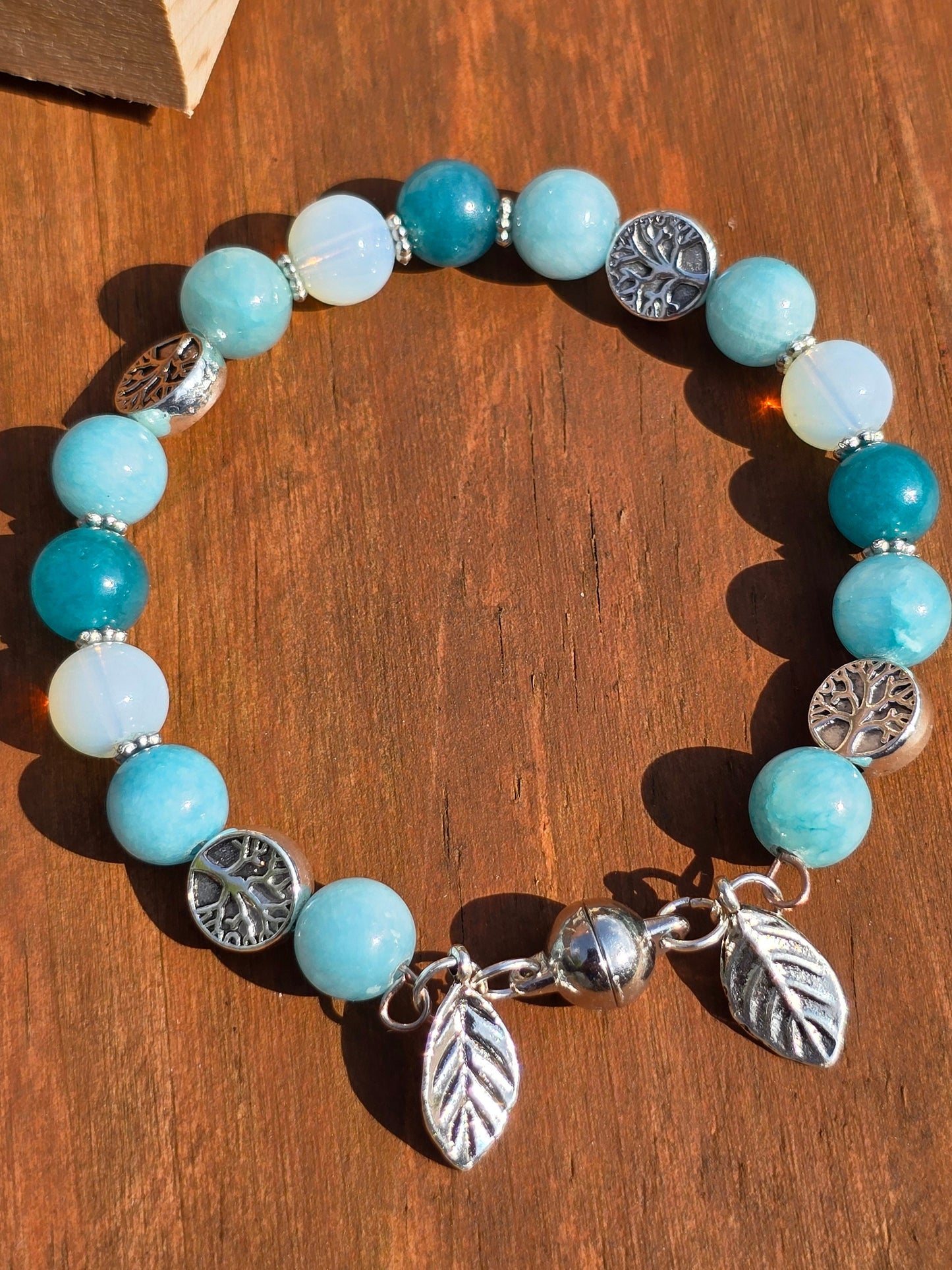 Blue Tree and Leaf Memory wire bracelet with magnetic clasp