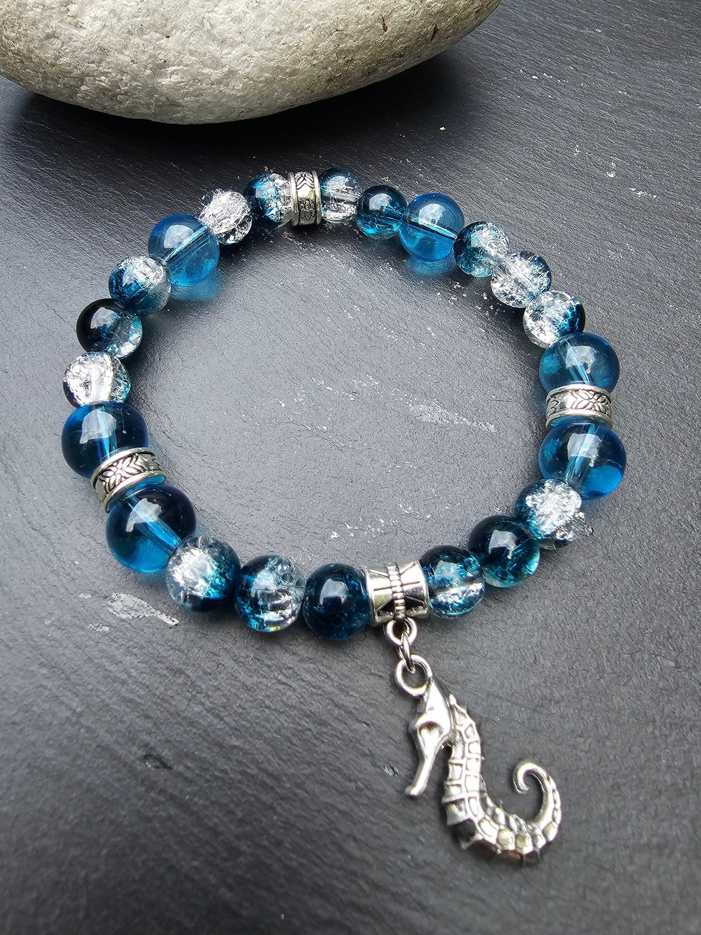 Seahorse charm beaded bracelet - Blue and clear glass beads and elasticated band to fit most wrist sizes