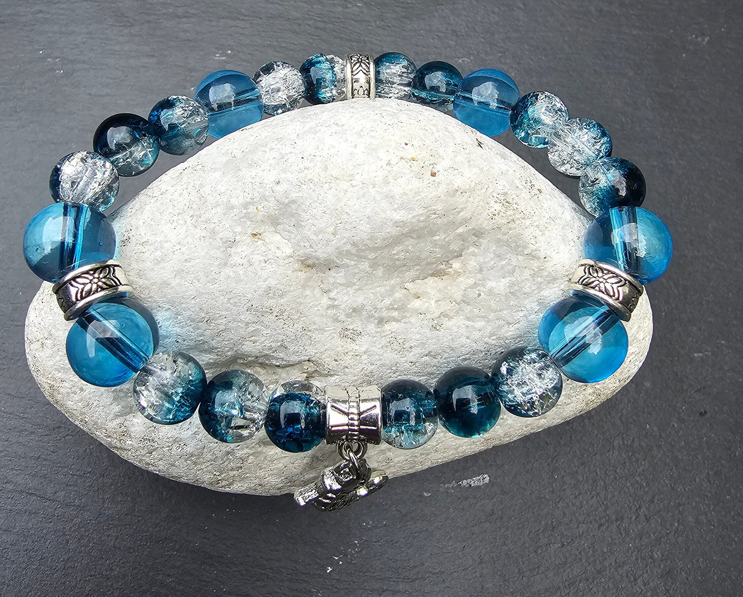 Seahorse charm beaded bracelet - Blue and clear glass beads and elasticated band to fit most wrist sizes