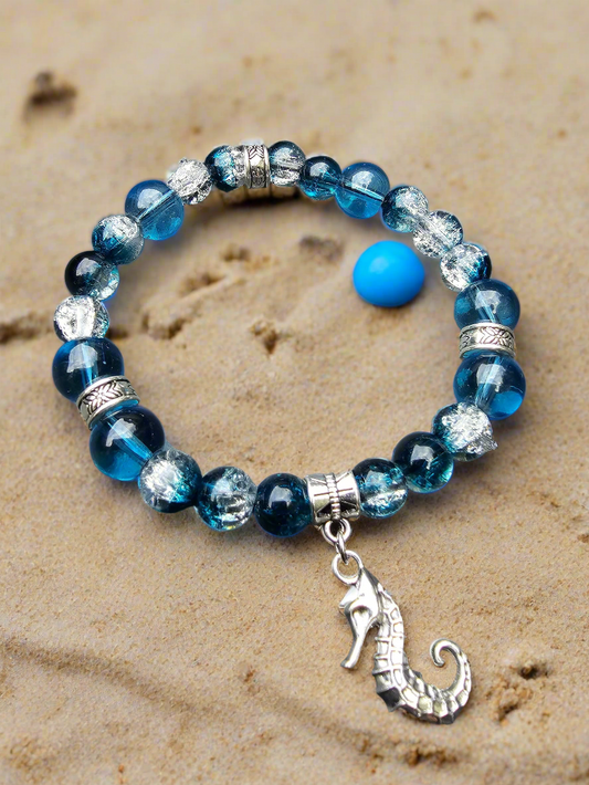 Seahorse charm beaded bracelet - Blue and clear glass beads and elasticated band to fit most wrist sizes